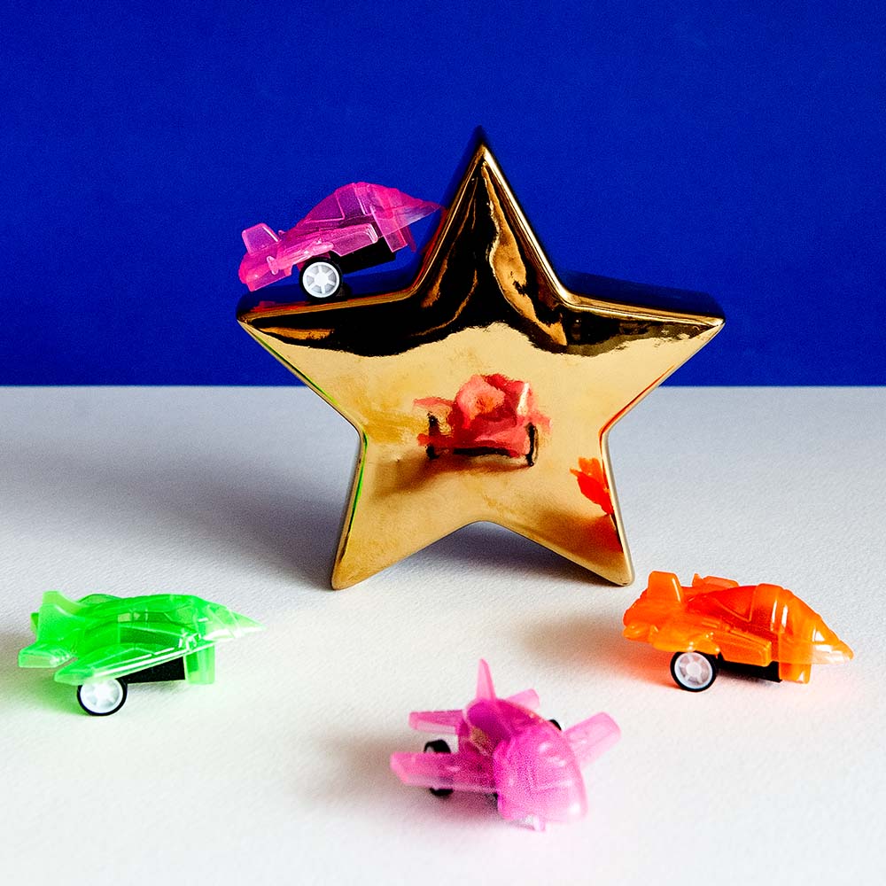 Set 4 terugtrekstraaljagers 5 neonkleuren (5 x 5 cm)